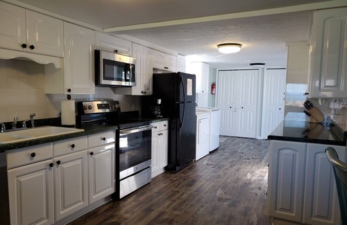 Elk Rapids House | BeachFrontRental-Tennis court&playground directly across the street!DogsWelcome