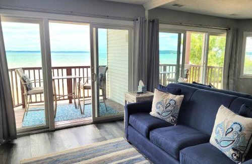 Traverse City House | Beachside 213 with Pool Hot Tub and Private Deck overlooking East Bay