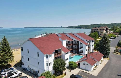 Traverse City House | Beachside 213 with Pool Hot Tub and Private Deck overlooking East Bay