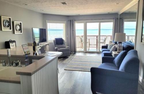 Traverse City House | Beachside 213 with Pool Hot Tub and Private Deck overlooking East Bay