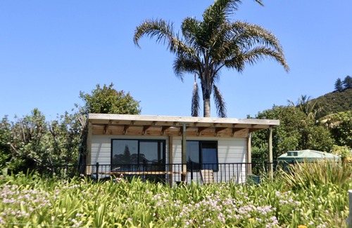 Pataua Cabin | Beachside Cabin with view of Mount Pataua and Surf bar
