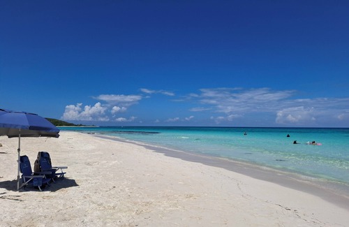 Silver Sands Apartment | Beachside calm: Footsteps to the sand and sea