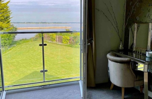 Brightlingsea House | Beachside house with uninterrupted sea views