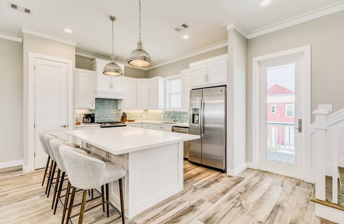 Beachside Village House | Beachside Village ocean-view home with pool, multiple balconies & EV charger