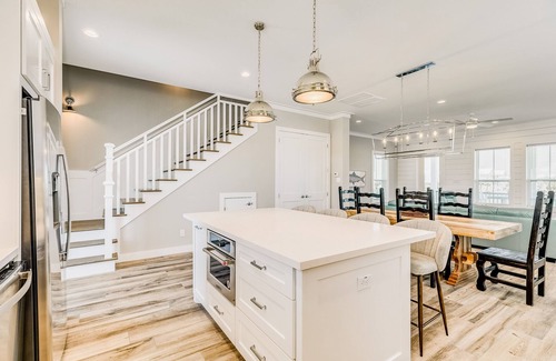 Beachside Village House | Beachside Village ocean-view home with pool, multiple balconies & EV charger