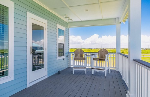 Beachside Village House | Beachside Village ocean-view home with pool, multiple balconies & EV charger