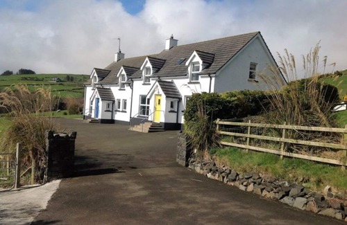 Glenariff Cottage | Beachview Cottage Co. Antrim blue door 4 bedrooms
