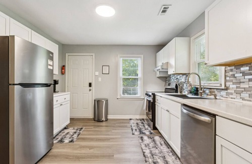Kansas City House | Beachy Haven Duplex - 3BR/2BA, Pet-Friendly with Firepit