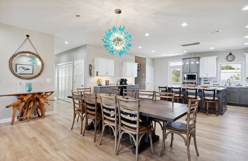 Folly Beach House | BeachZilla! Oceanfront Pet Friendly! Screen Porch with Dining Area