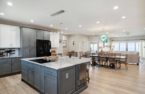 Folly Beach House | BeachZilla! Oceanfront Pet Friendly! Screen Porch with Dining Area