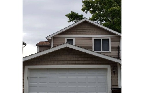 Haslett House | Beautiful 4Br 4Ba lake home with private waterfront