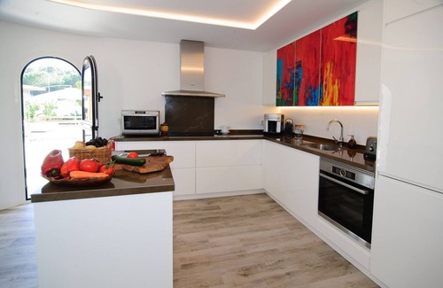 San Antonio Bay Villa | Beautiful spacious modern villa with a large private saltwater swimming pool