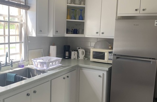 Green Garden Apartment | Beautiful 2 bed 2 bath town-house with pool and sea views.