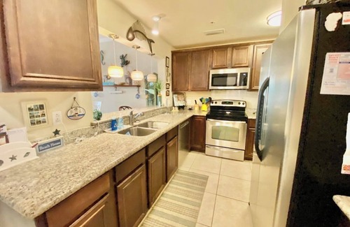 Henderson Point Apartment | Beautiful 2 bedroom poolside condo with majestic beach view