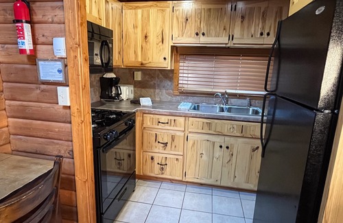 Almont Cabin | Beautiful 2 Bedroom Cabin on Taylor River with Private Hot Tub
