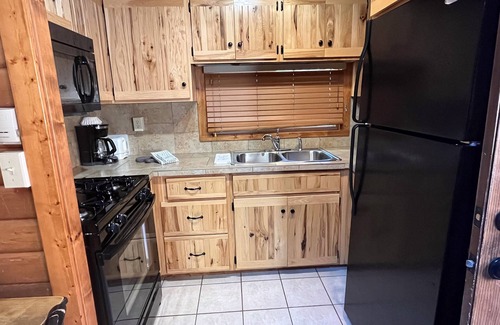 Almont Cabin | Beautiful 2 Bedroom Cabin on Taylor River with Private Hot Tub