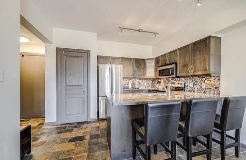 South Pandosy Condo | Beautiful 2BR + Den Condo in Kelowna. Huge Corner Balcony!