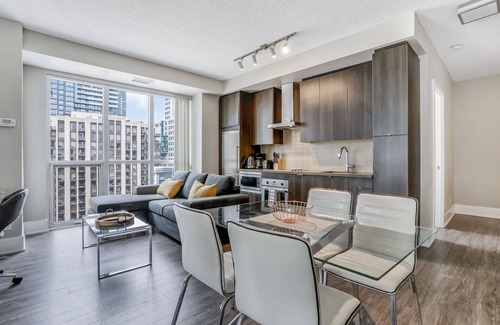 Wellington Place Condo | Beautiful 3 Bedroom 2 Bath Condo Suite - Fully Equipped, Fully Furnished