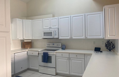 Bell Channel Bay Condo | Beautiful 3 Bedroom Penthouse Apartment on Bell Channel with a 30' Dock Slip!