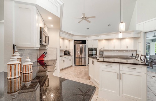Bonita Bay House | Beautiful 4 Bed/3 Bath 3,600 SF Home with Outdoor Heated Pool/Spa in Bonita Bay