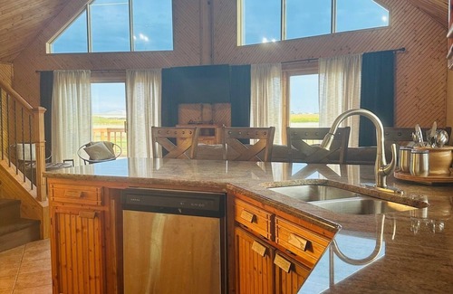 Aberdeen Cabin | Beautiful A-frame log home-spacious living/dining room-ideal for special events.
