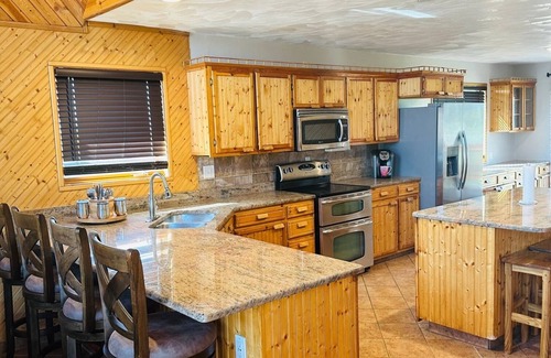 Aberdeen Cabin | Beautiful A-frame log home-spacious living/dining room-ideal for special events.