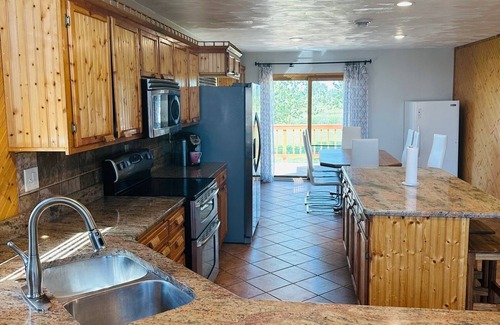 Aberdeen Cabin | Beautiful A-frame log home-spacious living/dining room-ideal for special events.
