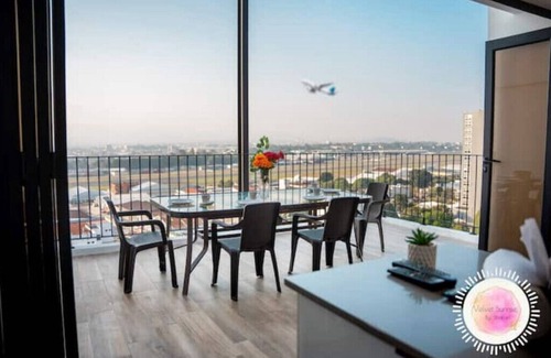 Colonia Bella Aurora Apartment | Beautiful Apt-Airport, Pizza Oven, Grill, Below