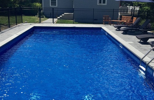 Shinnecock Hills House | Beautiful accommodations and refreshing pool in a serene setting