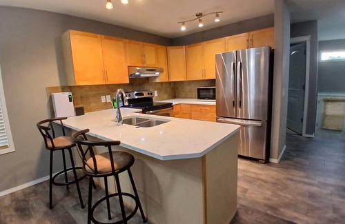Airdrie House | Beautiful and cozy bi-level home in a serene and peaceful neighborhood.