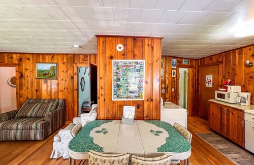 Wells Cottage | Beautiful and serene cottage with beach, dock, lake views, fishing, and A/C