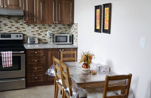 Caledon House | Beautiful and spacious two bed room Basement Apartment