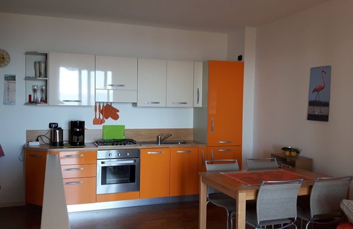 Pulciano Apartment | Beautiful apartment with loggia, fantastic view of Lake Garda, infinity pool, garden