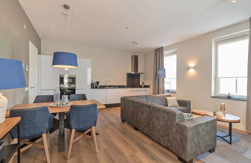 Colijnsplaat Apartment | Beautiful apartment for 4 guests with hot tub, WIFI, TV, balcony and parking