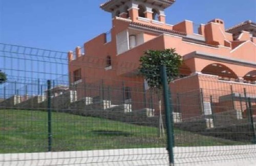 Los Puertos Apartment | Beautiful apartment 500 m from the beach with private garden and sea views