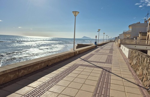 Platja de Piles Apartment | Beautiful apartment Lilou in 1st line sea view, swimming pool and palm trees