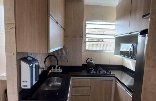 Aparecida Apartment | Beautiful apartment, overlooking the sea at Ponta da Praia with Internet Access