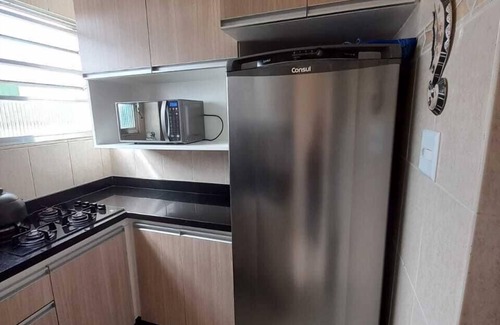 Aparecida Apartment | Beautiful apartment, overlooking the sea at Ponta da Praia with Internet Access