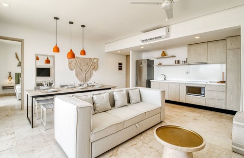 Zama Apartment | Beautiful apartment with rooftop pool, fitness area, & balcony