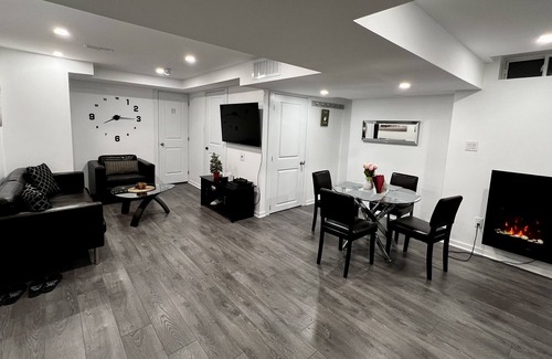 Alcona Apartment | Beautiful basement apartment with fireplace