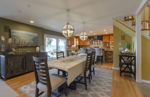 Suttons Bay House | Beautiful Beach Front on Suttons Bay with Sunset Views.