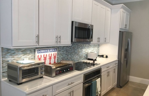 Villa Lago House | Beautiful beach home vacation families include golf cart, loaded,pets welcome