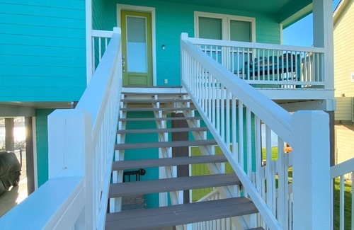 Cedar Lane House | Beautiful beach house boasts a scenic water view from its front and back doors.
