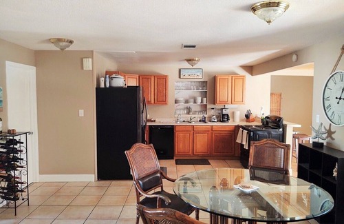 Villa De Palmas House | Beautiful Beach Style Home by Port Canaveral w/Private Salt Water pool