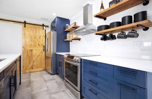 Sanford Condo | Beautiful Blue oasis in historic Sanford - KING SUITE with full washer dryer