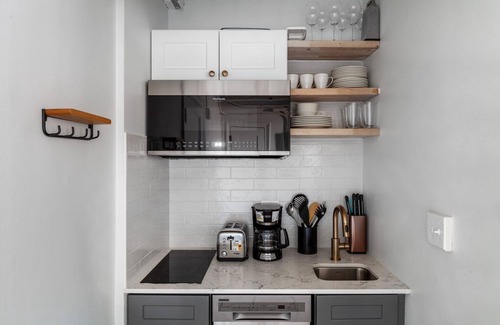 North Brookline Apartment | Beautiful Brookline Studio w/Gym, steps to Green Line, by Blueground
