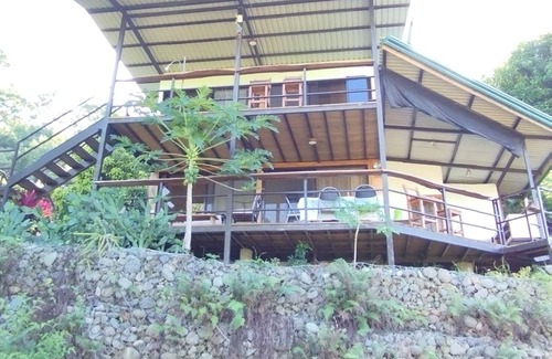 Quepos House | beautiful container house with beautiful views of the sea and the mountains