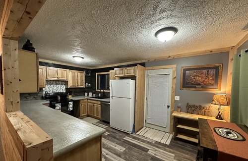 Lewiston House | Beautiful cabin-full garage, bring your toys, minutes from trails & town