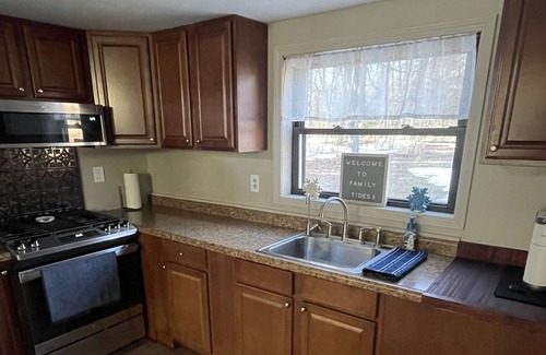Lake George Cabin | Beautiful cabin on Lake George with a tiki bar on the water