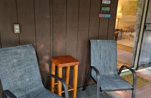 Shore House | Beautiful cabin situated on wooded land with nice yard clearing and small stream